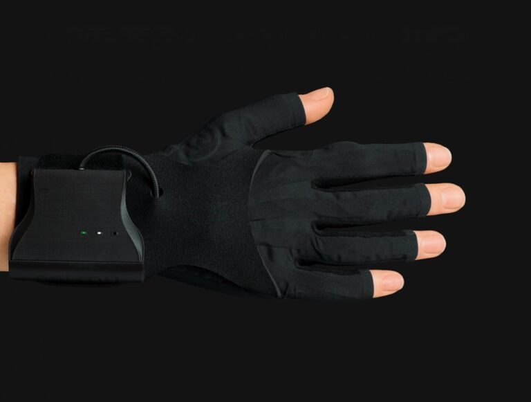 A hand wearing a MiMU fingerless glove on a dark background.